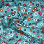 Preview: Canvas „Blooming Breeze“ – bunte Blüten auf Türkis