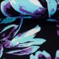Preview: Viskose , streetartige Magnolienblüten Hellblau/Lila auf Schwarz